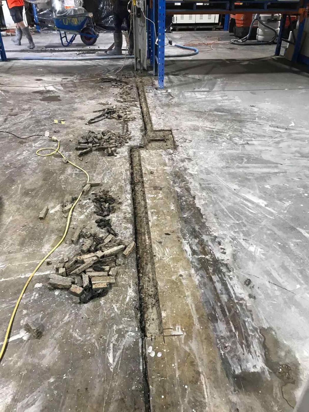 Warehouse trench broken out between saw cuts
