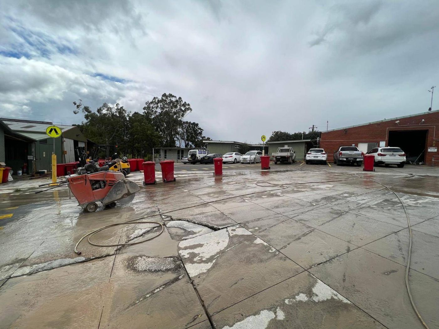 Saw-cut sections in an industrial yard slab